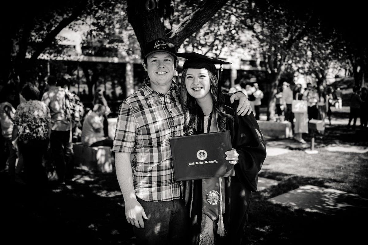 Black-and-white portrait at a Utah Valley University graduation