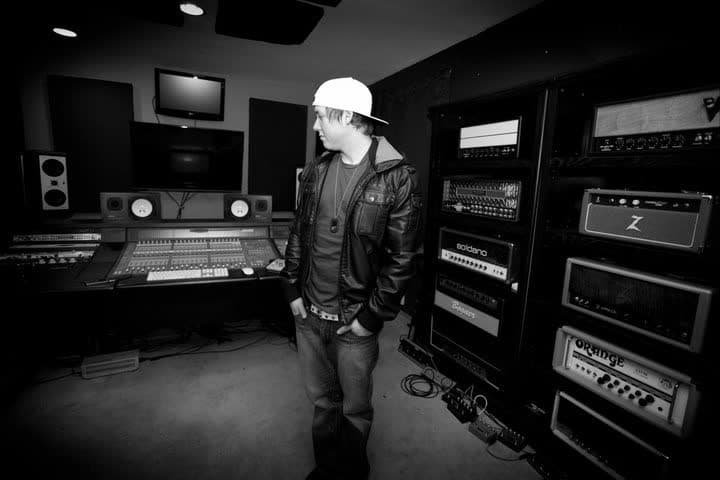 Candid studio photo from the recording studio era