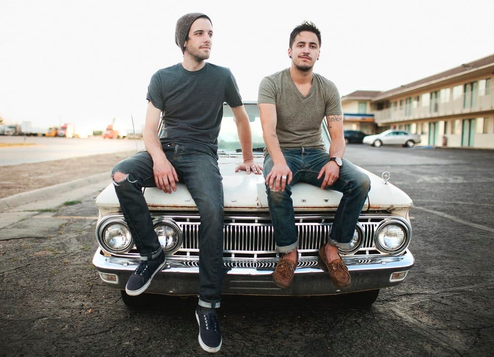 The Scene Aesthetic: two band members seated on the hood of a car