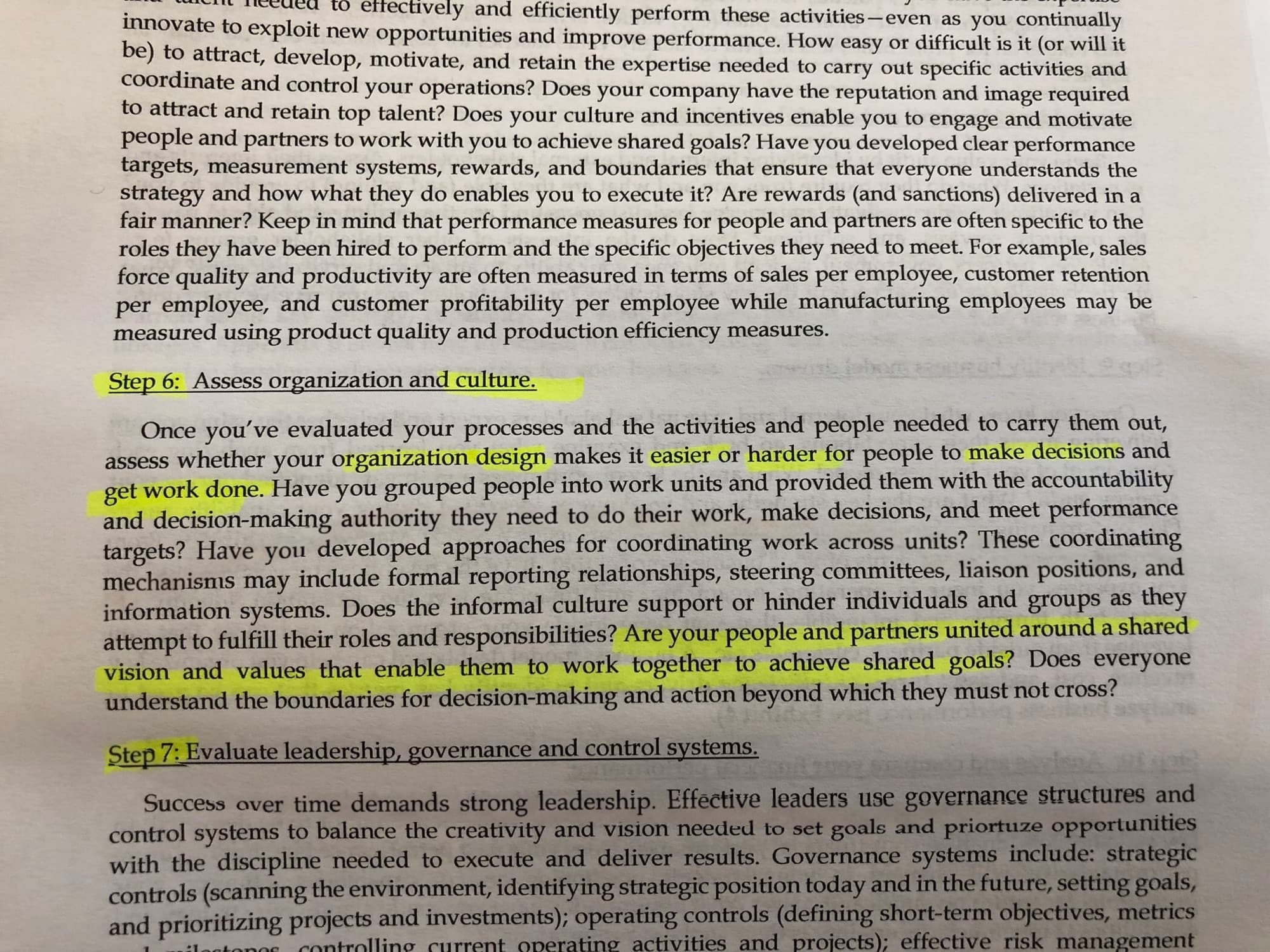 A printed case study page, highlighted in yellow, asking whether your people and partners are united around a shared vision and values