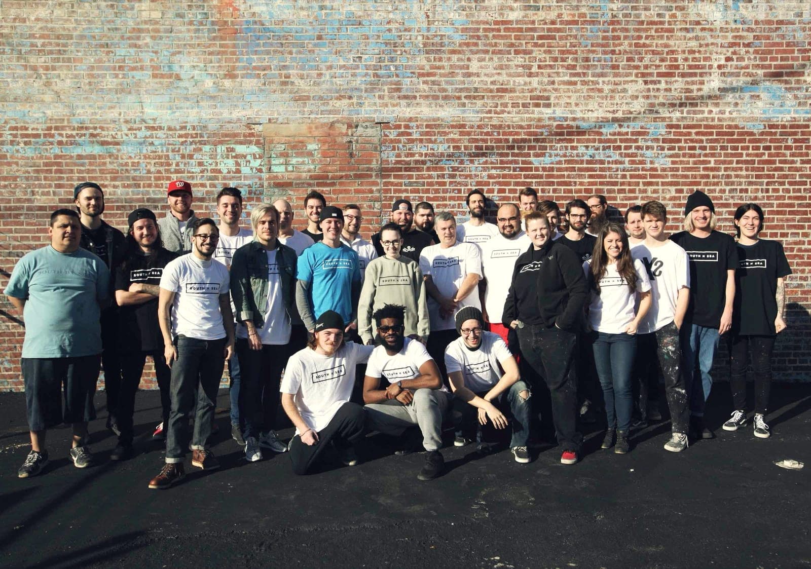 The South by Sea team outside the Nashville print shop