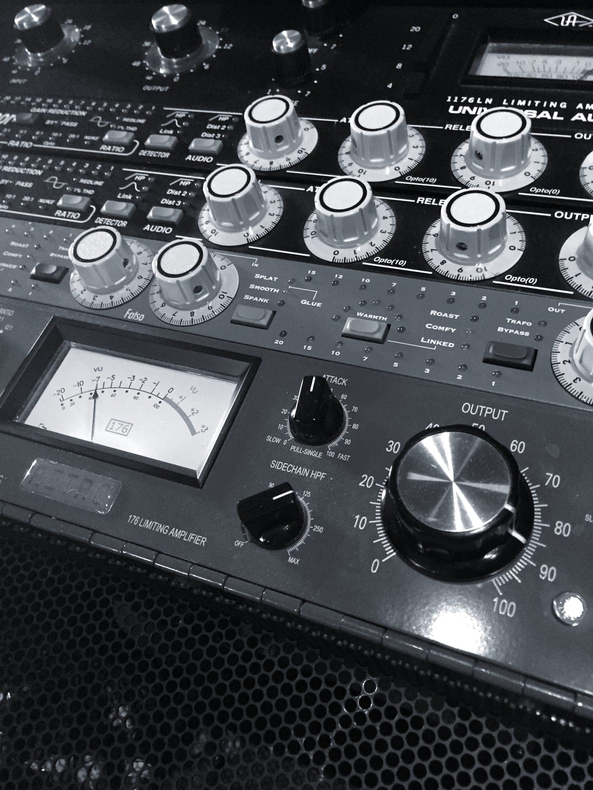 Illuminated VU meters glow across an outboard rack in Studio A.